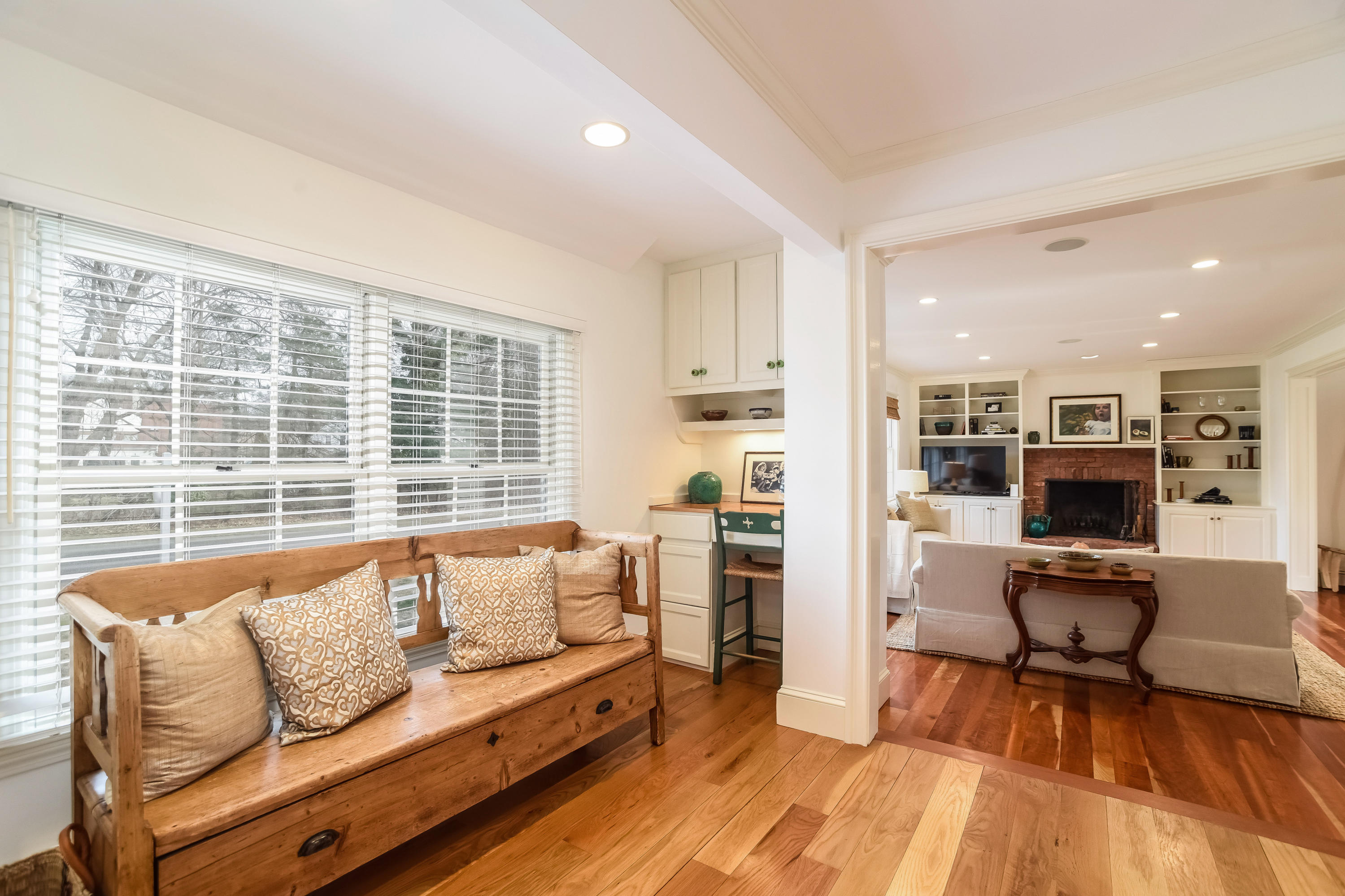8 Laforge Road Darien, CT 06820 - Photo 16 of 34 a living room with furniture and a large window