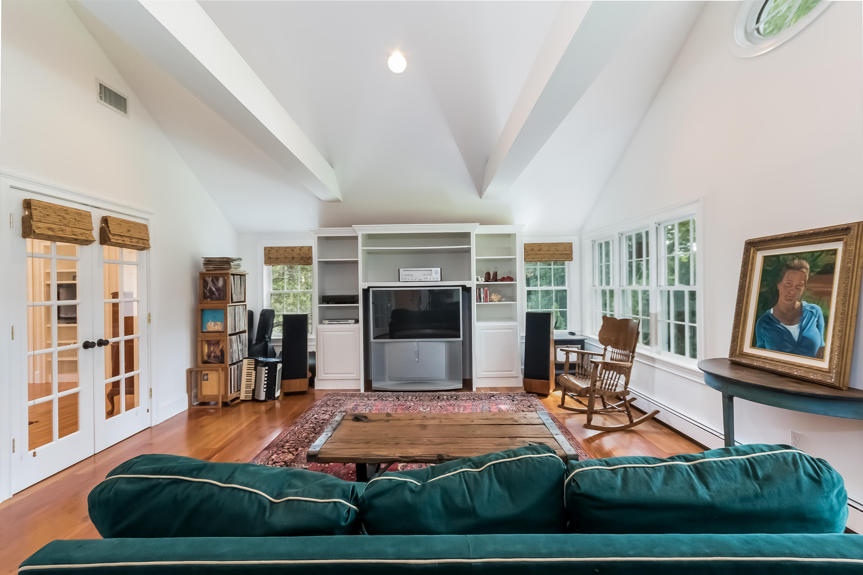 8 Laforge Road Darien, CT 06820 - Photo 24 of 34 a room with lots of furniture and a rug