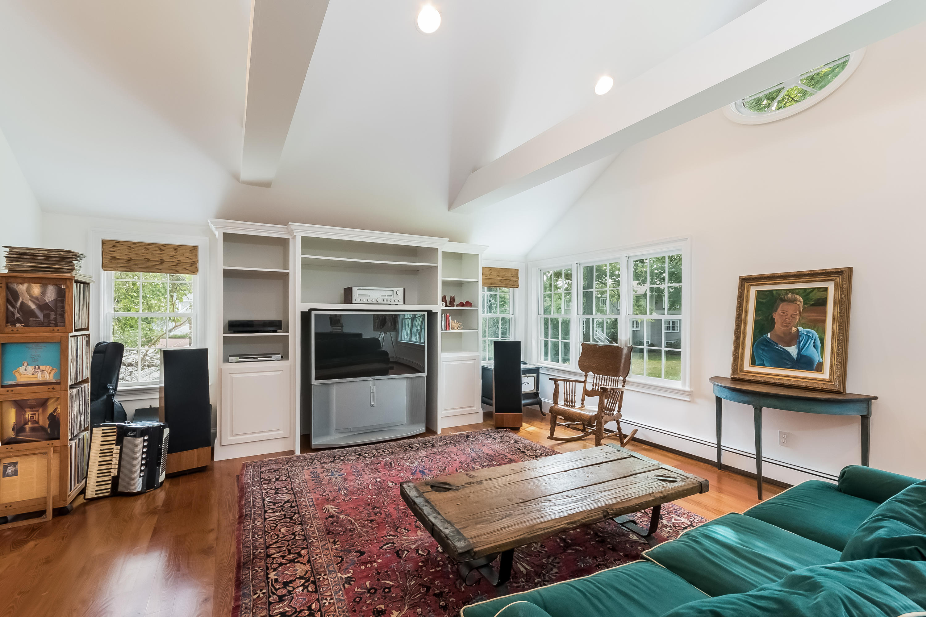 8 Laforge Road Darien, CT 06820 - Photo 25 of 34 a living room with furniture pool table and a flat screen tv