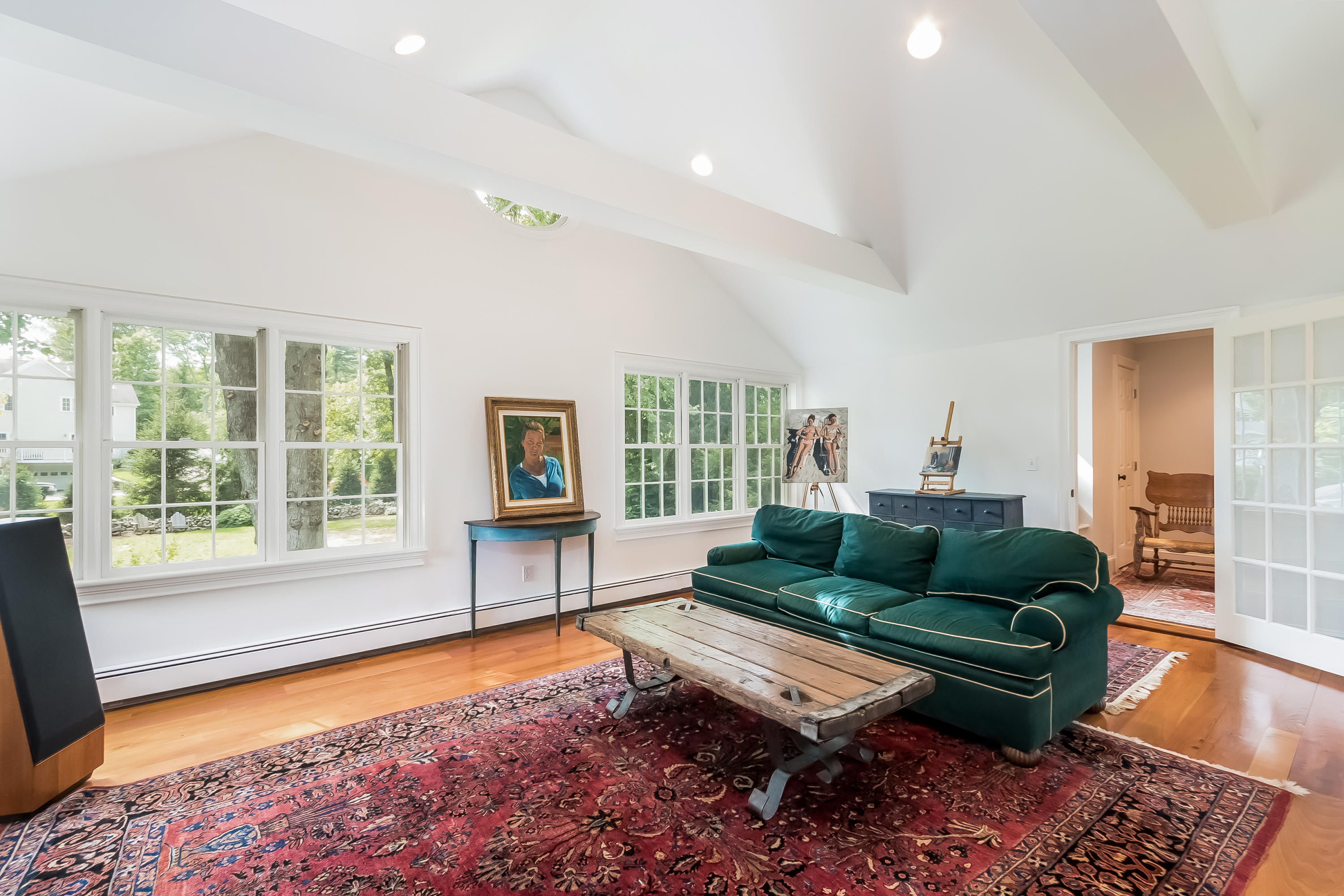 8 Laforge Road Darien, CT 06820 - Photo 26 of 34 a living room with furniture and a rug