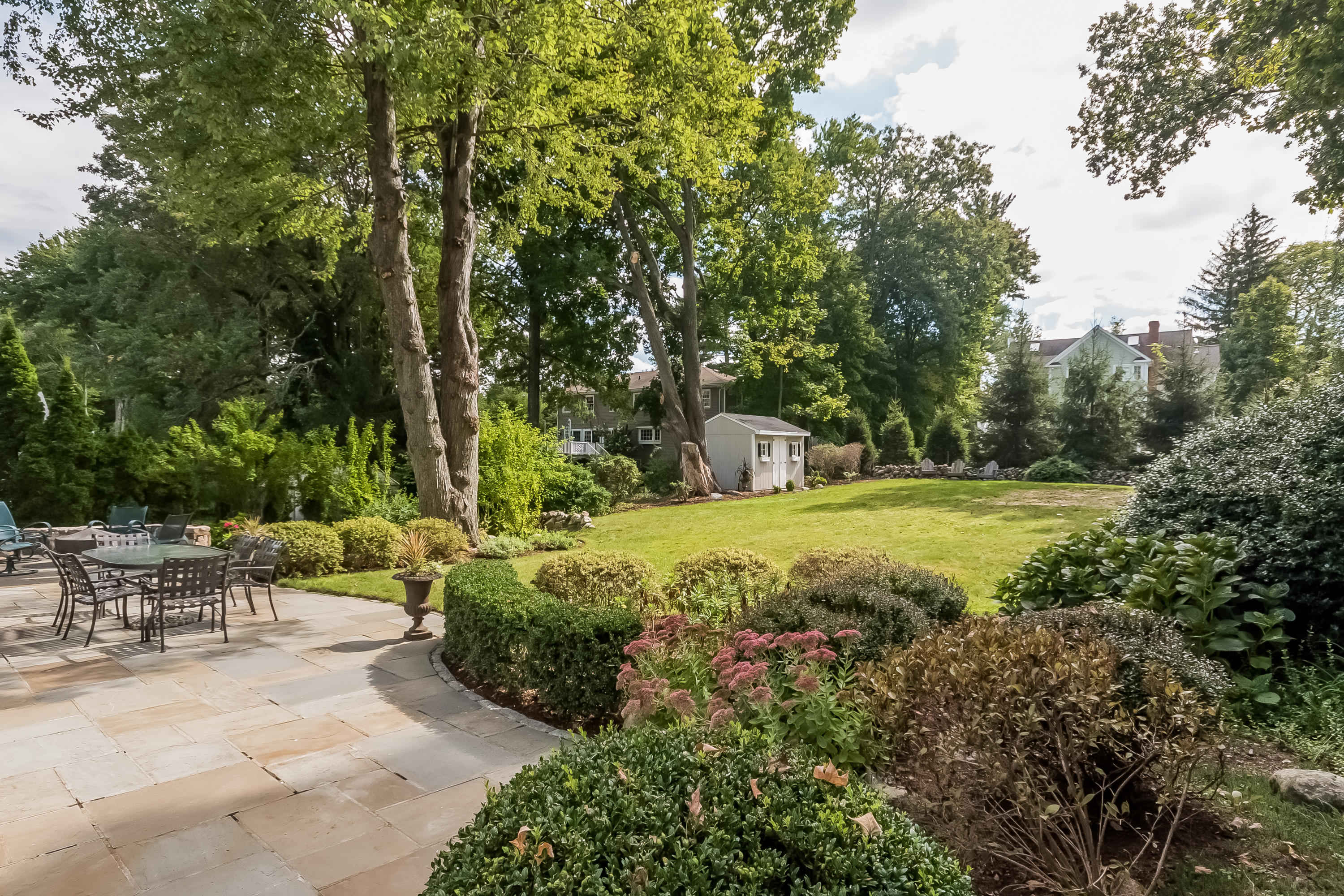 8 Laforge Road Darien, CT 06820 - Photo 4 of 34 a view of backyard with swimming pool
