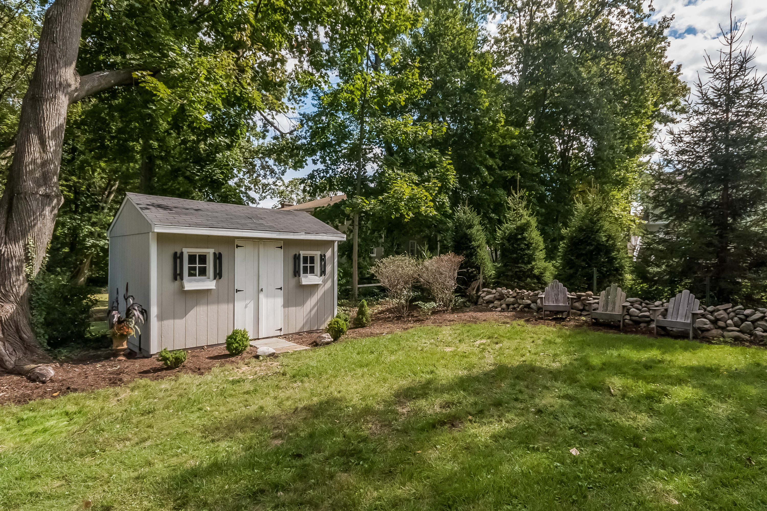 8 Laforge Road Darien, CT 06820 - Photo 6 of 34 a view of a house with backyard and sitting area