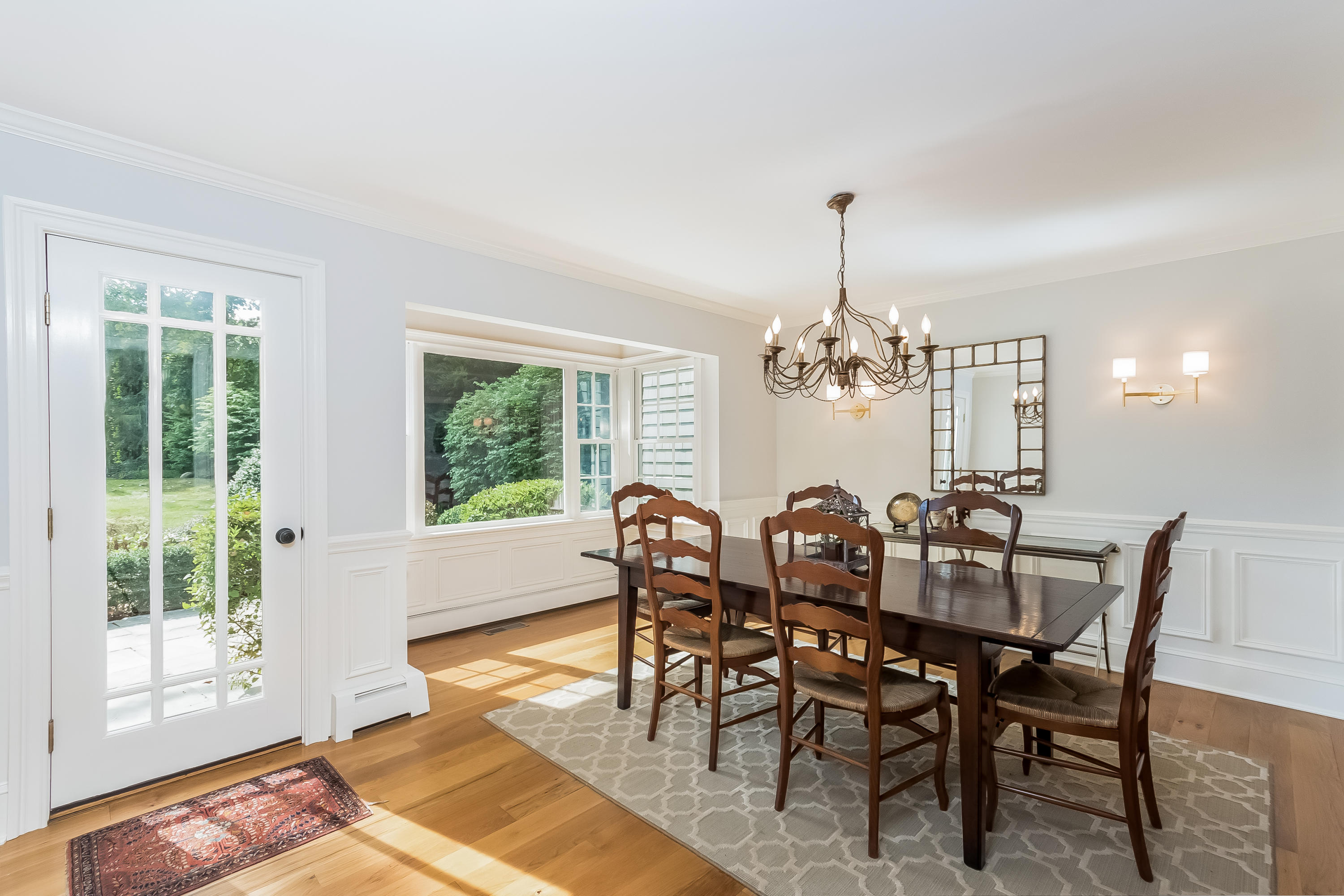 8 Laforge Road Darien, CT 06820 - Photo 10 of 34 a view of a dining room with furniture window and outside view