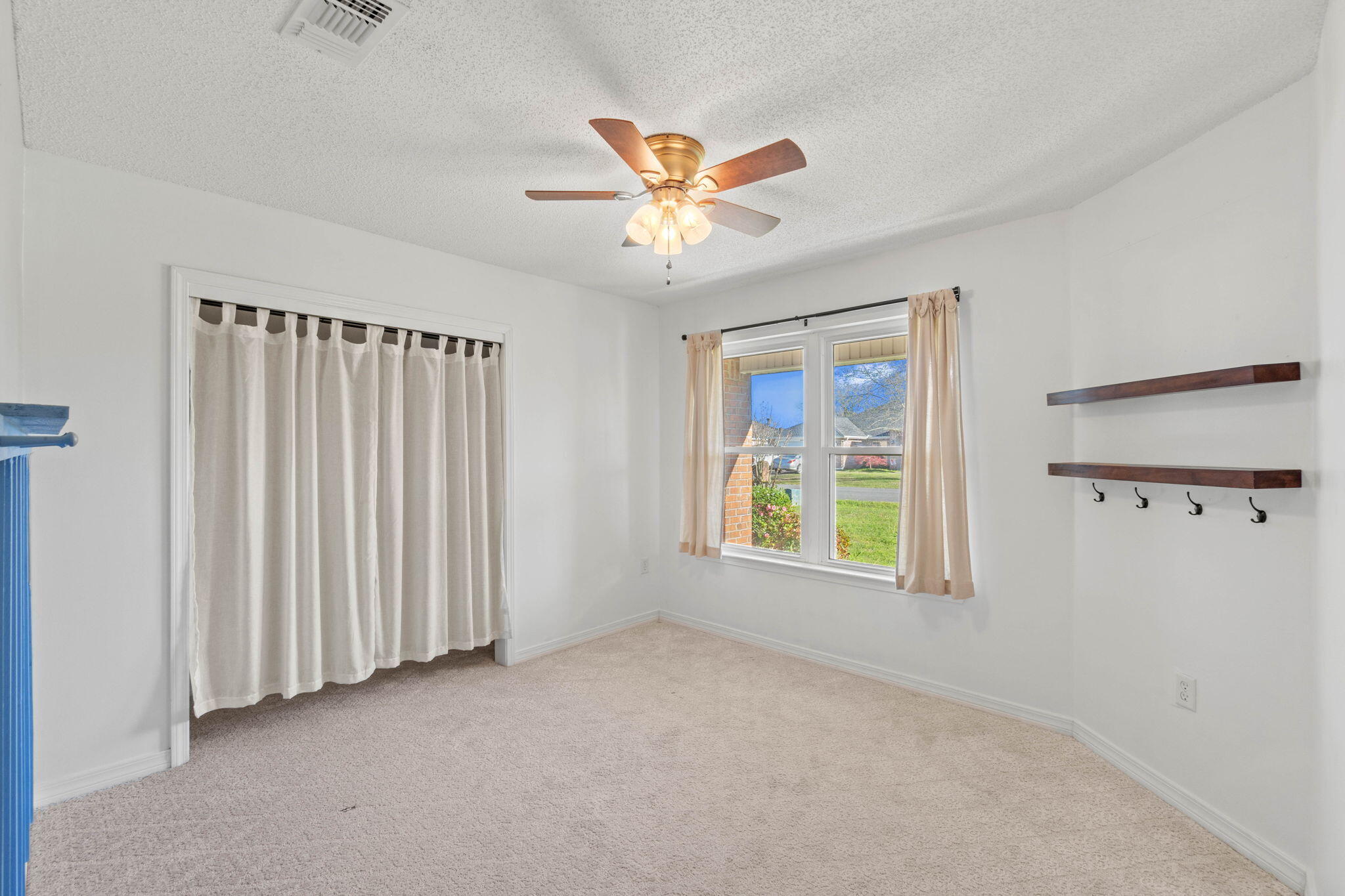 3128 Border Creek Drive Crestview, FL 32539 - Photo 16 of 23 a view of an empty room with a window