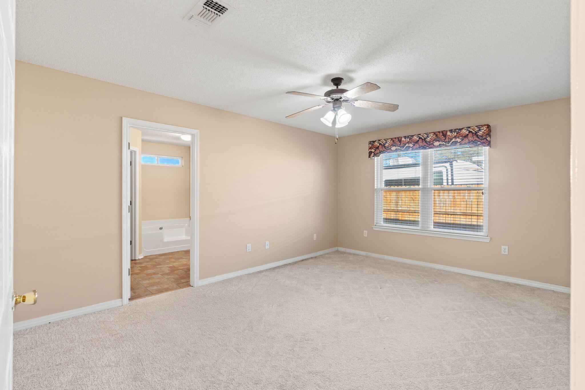 3128 Border Creek Drive Crestview, FL 32539 - Photo 17 of 23 a view of an empty room with a window