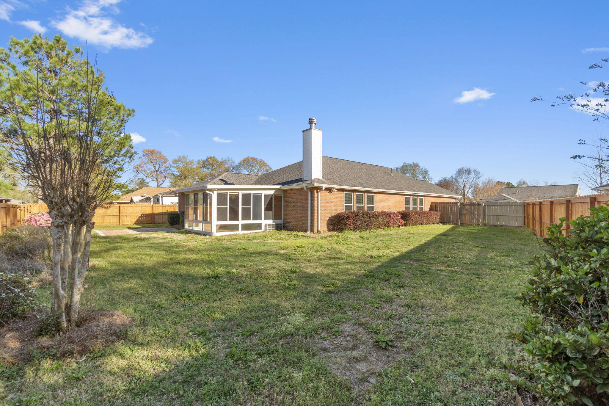 3128 Border Creek Drive Crestview, FL 32539 - Photo 23 of 23 a front view of a house with a garden