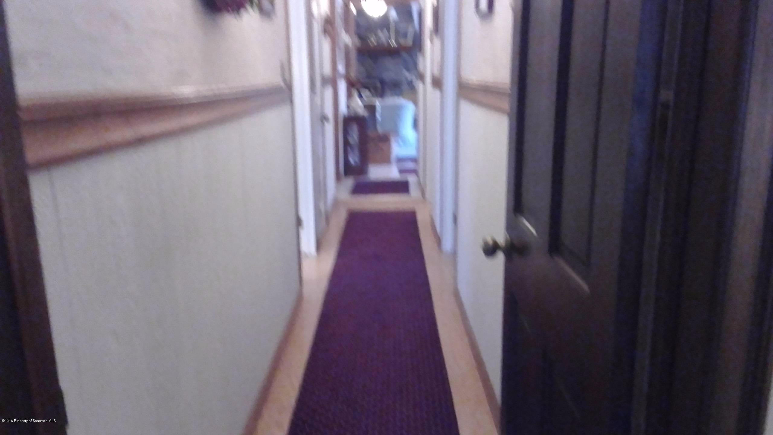 3225 Major Road Moscow, PA 18444 - Photo 26 of 27 a view of a hallway with wooden floor