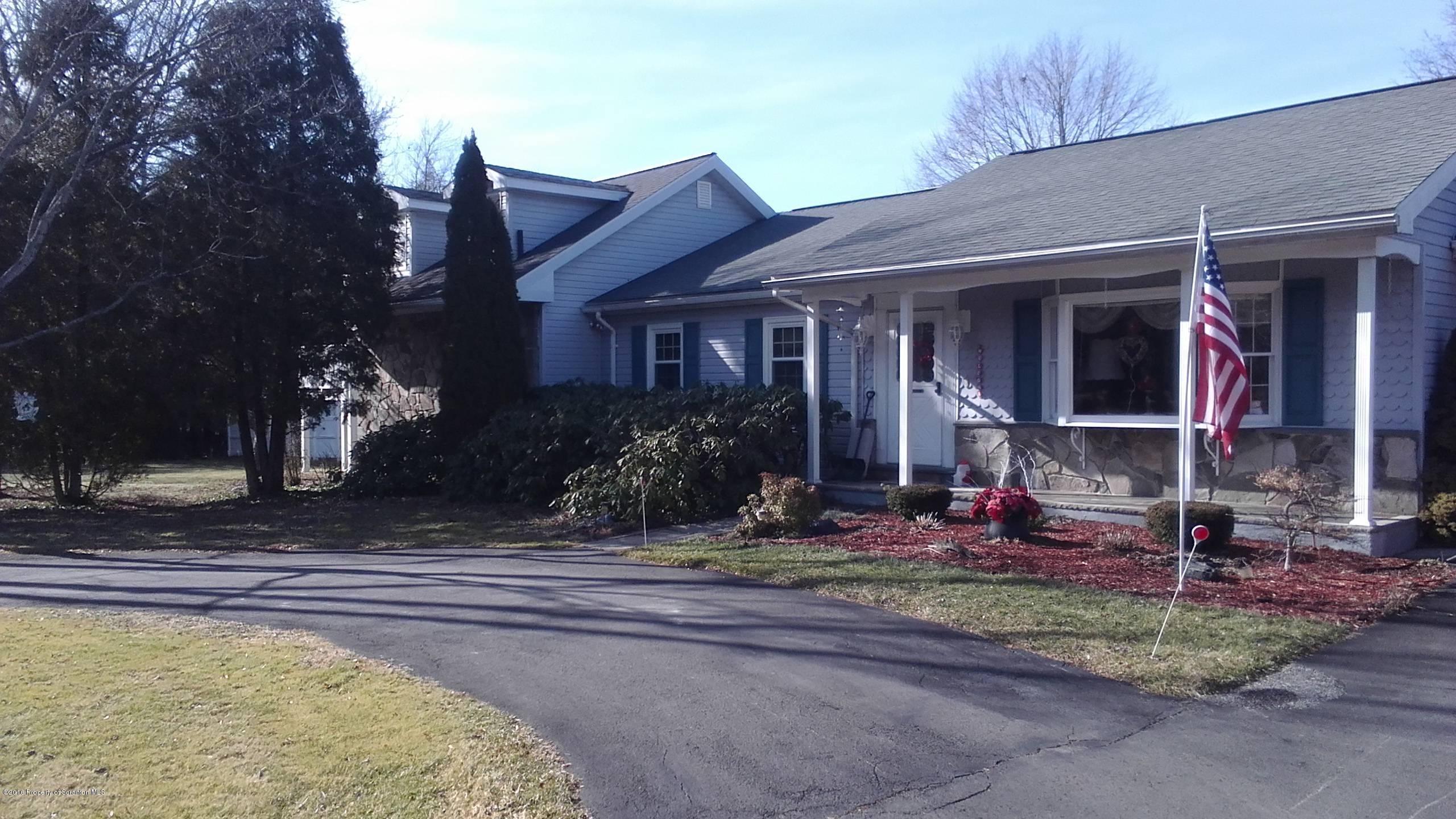 3225 Major Road Moscow, PA 18444 - Photo 3 of 27 a view of a house with backyard and plants