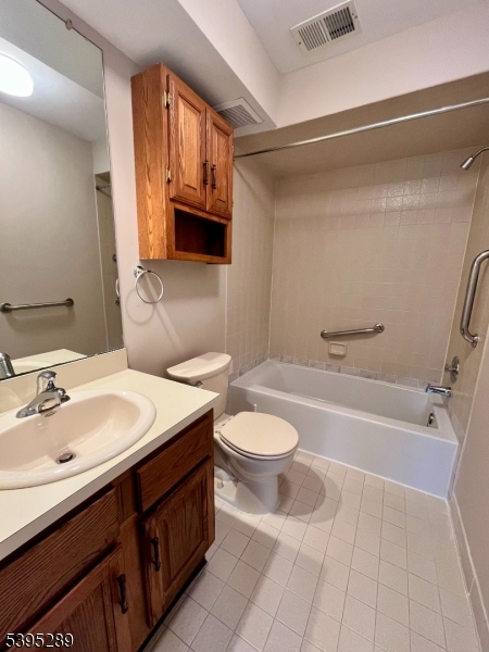 133 Mockingbird Court Three Bridges, NJ 08887 - Photo 16 of 21 a bathroom with a sink a toilet and bathtub