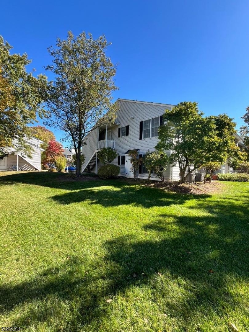 133 Mockingbird Court Three Bridges, NJ 08887 - Photo 17 of 21 a view of a house with a big yard