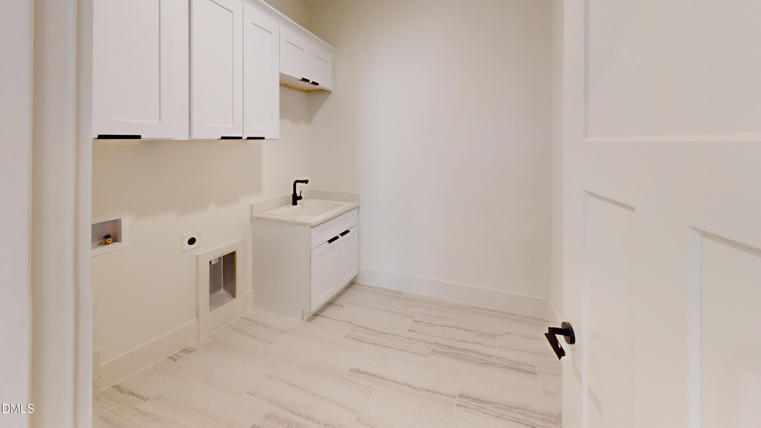 5009 Hopkins Chapel Road Zebulon, NC 27597 - Photo 28 of 28 Brians-House-Laundry