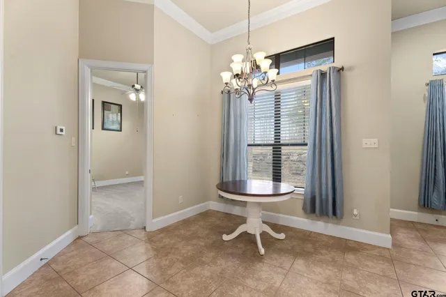 a view of a room with a windows and cabinet