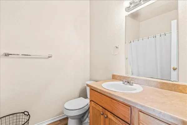 a bathroom with a sink and a toilet