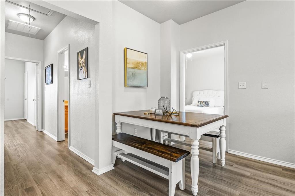 115 Collett Court Weatherford, TX 76088 - Photo 2 of 11 a view of a livingroom with furniture and wooden floor