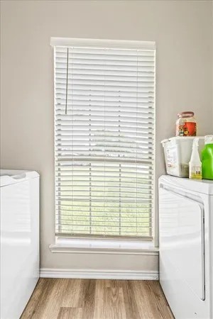a view of a room that has a window in it
