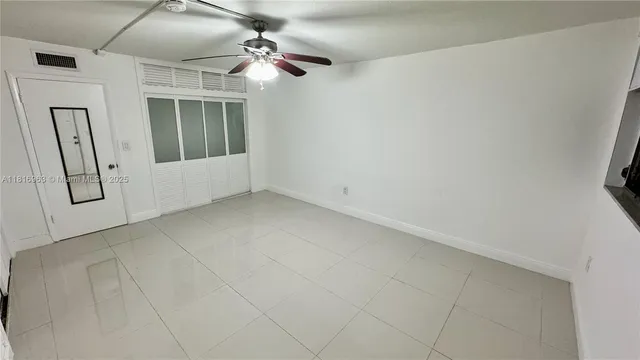 en empty room with windows