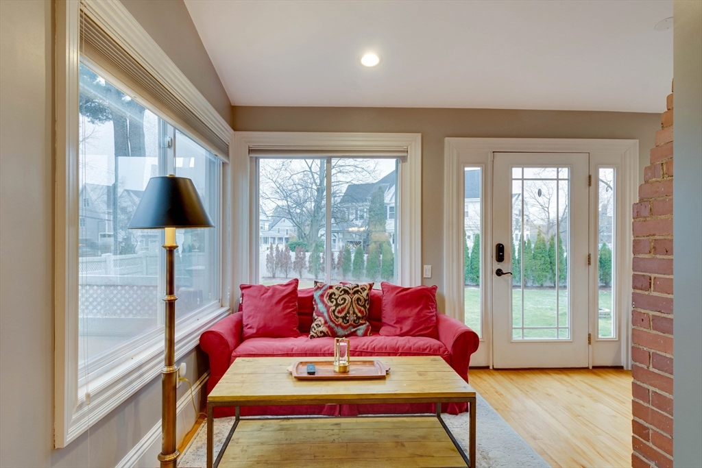 12 Mishawum Road Woburn, MA 01801 - Photo 12 of 39 a living room with furniture and a flat screen tv