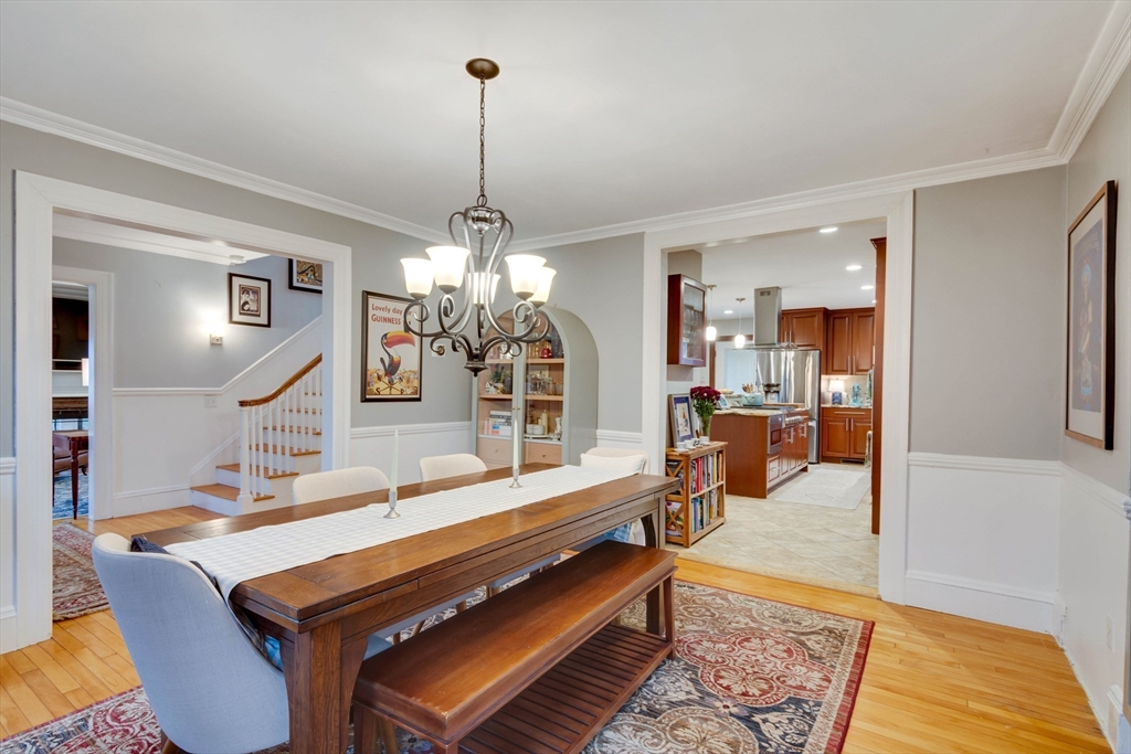 12 Mishawum Road Woburn, MA 01801 - Photo 14 of 39 a room with lots of furniture and a chandelier