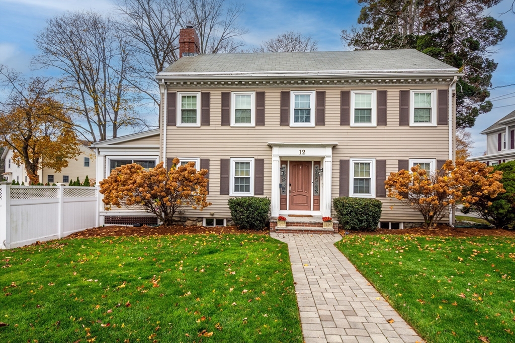 12 Mishawum Road Woburn, MA 01801 - Photo 2 of 39 a front view of a house with a yard