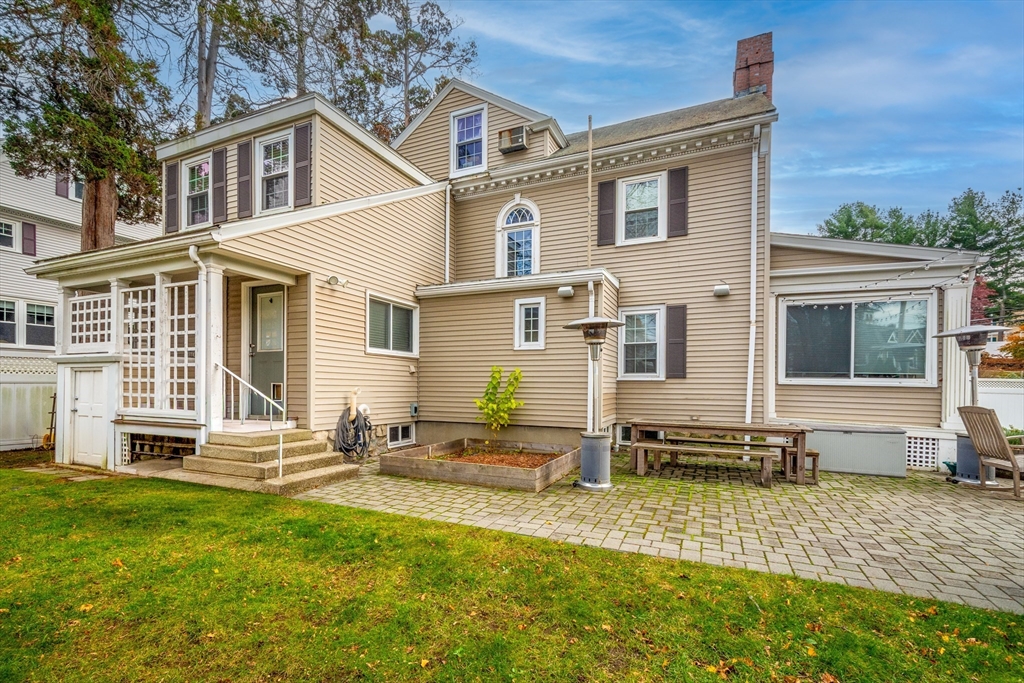 12 Mishawum Road Woburn, MA 01801 - Photo 30 of 39 a front view of a house with a yard