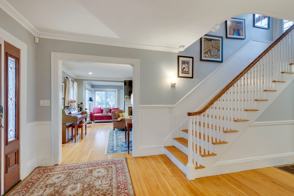 12 Mishawum Road Woburn, MA 01801 - Photo 3 of 39 a living room with furniture and a table