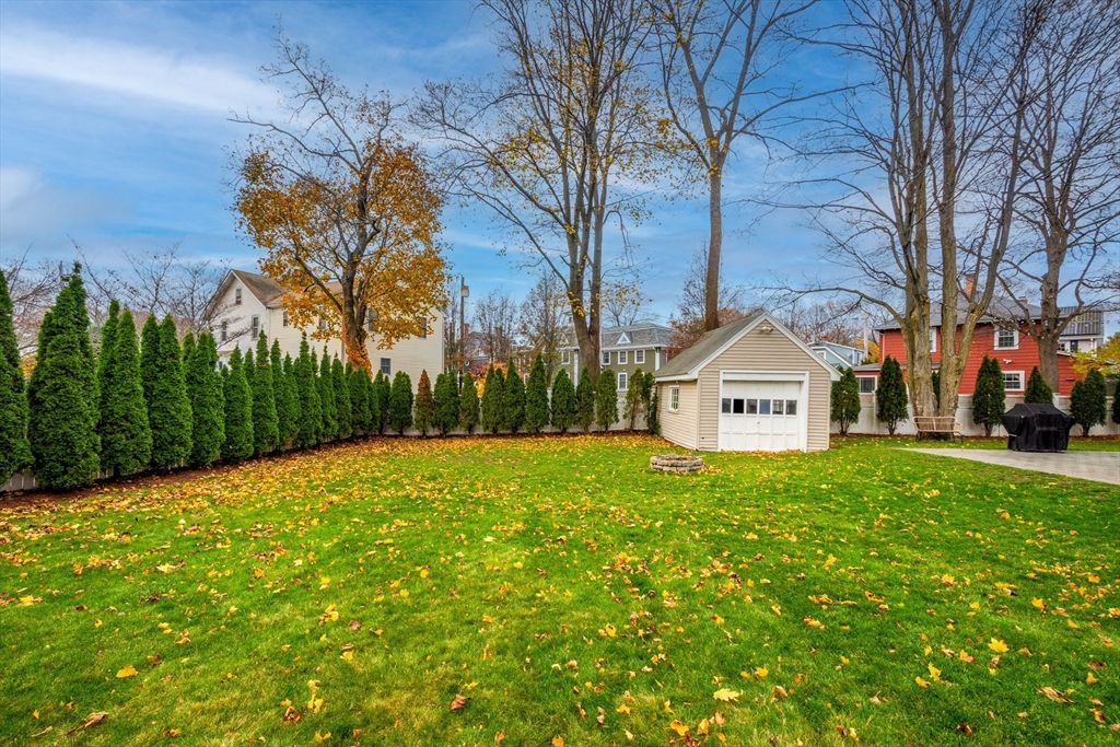 12 Mishawum Road Woburn, MA 01801 - Photo 33 of 39 a view of a house with a yard