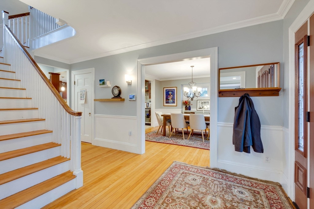 12 Mishawum Road Woburn, MA 01801 - Photo 4 of 39 a living room with furniture and a rug