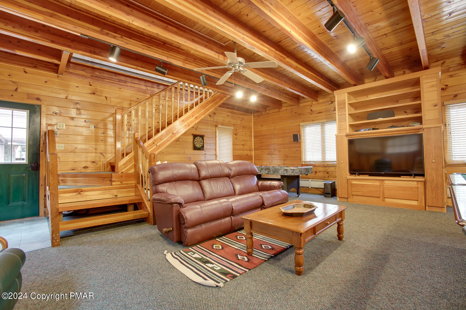 85 Starview Lane Wapwallopen, PA 18660 - Photo 31 of 102 a living room with furniture and a flat screen tv