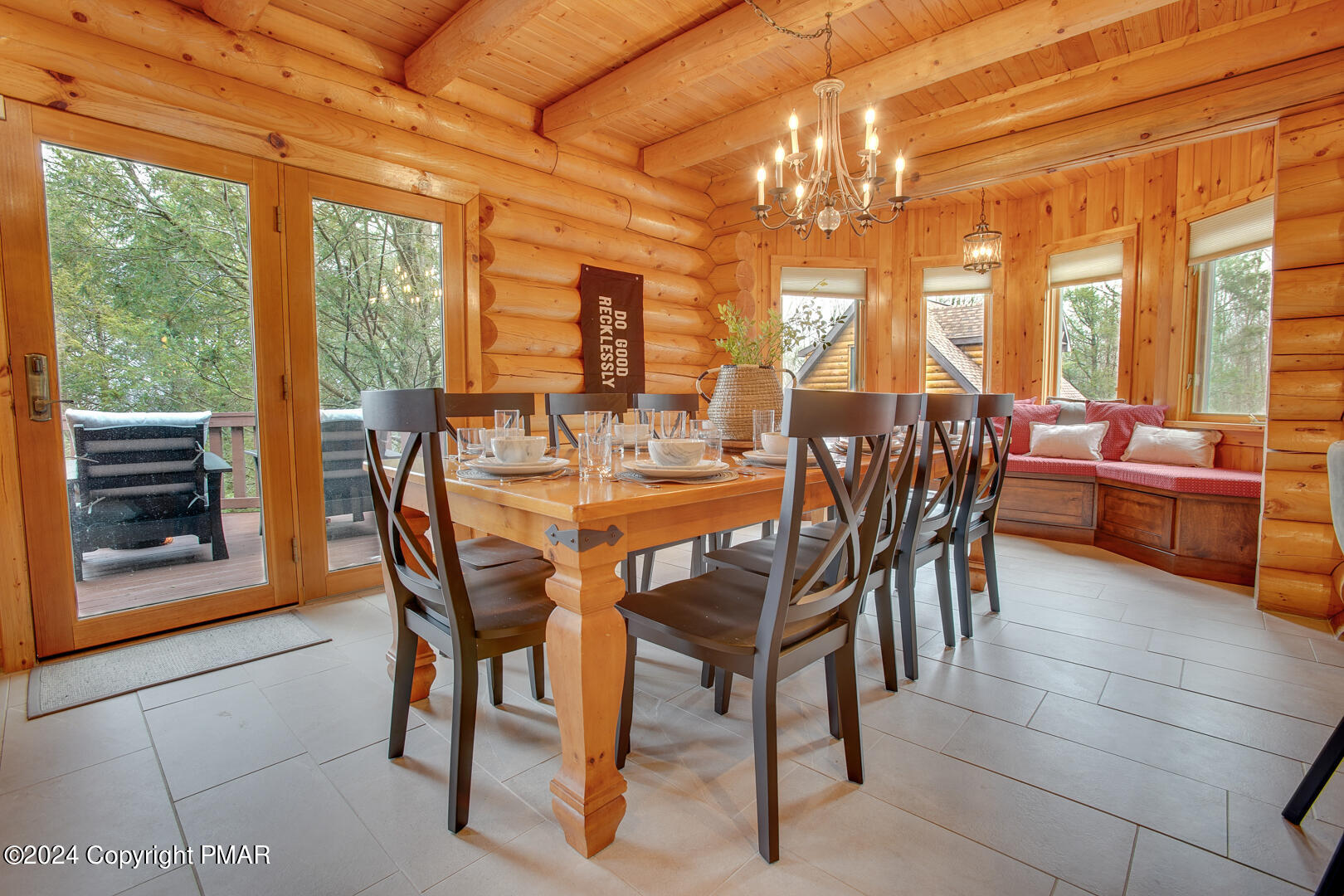 85 Starview Lane Wapwallopen, PA 18660 - Photo 58 of 102 a view of a dining room with furniture large windows and wooden floor