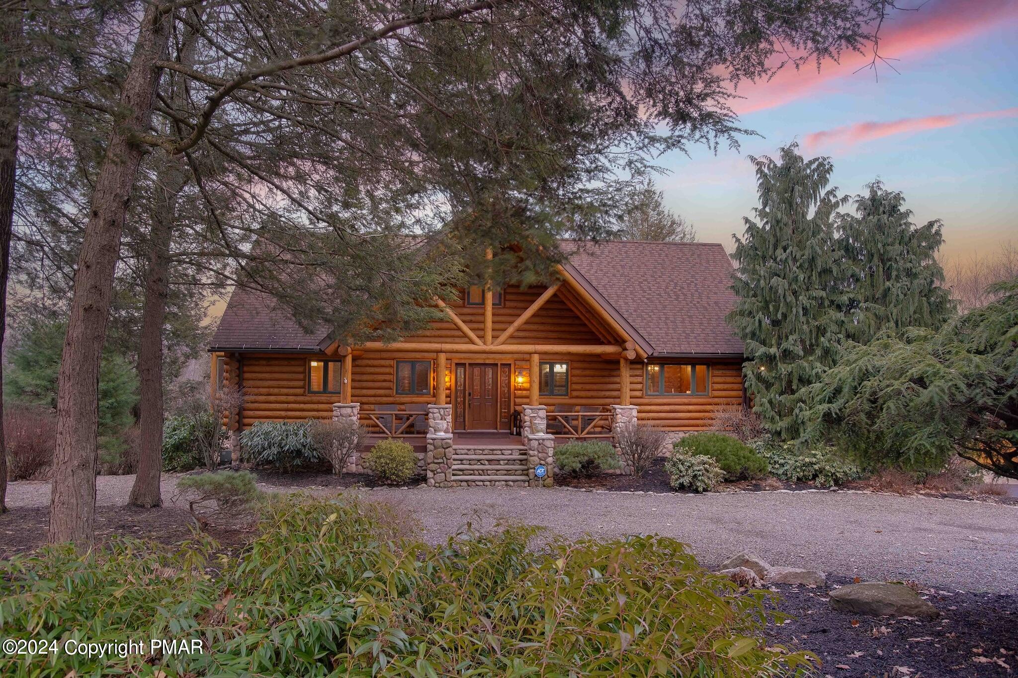 85 Starview Lane Wapwallopen, PA 18660 - Photo 6 of 102 a front view of house with yard and trees in the background