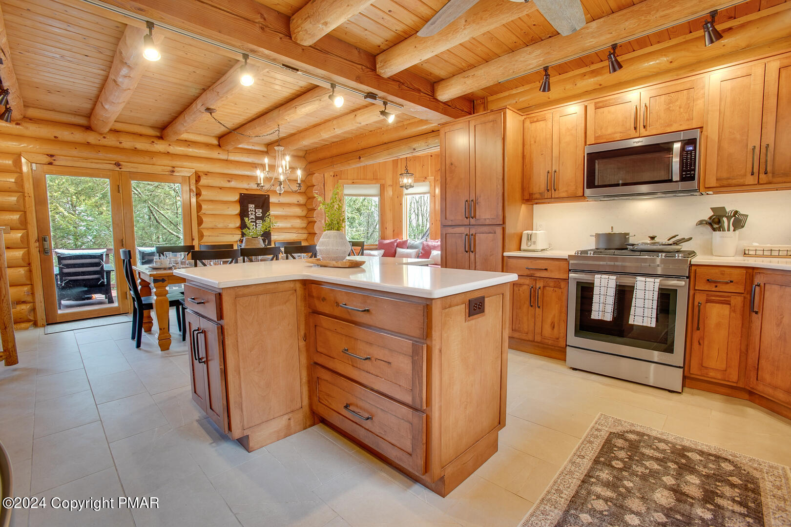 85 Starview Lane Wapwallopen, PA 18660 - Photo 64 of 102 a kitchen with stainless steel appliances granite countertop a stove a sink and a microwave