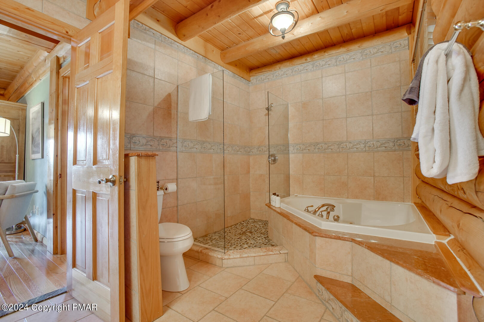 85 Starview Lane Wapwallopen, PA 18660 - Photo 68 of 102 a bathroom with a tub a toilet and a shower