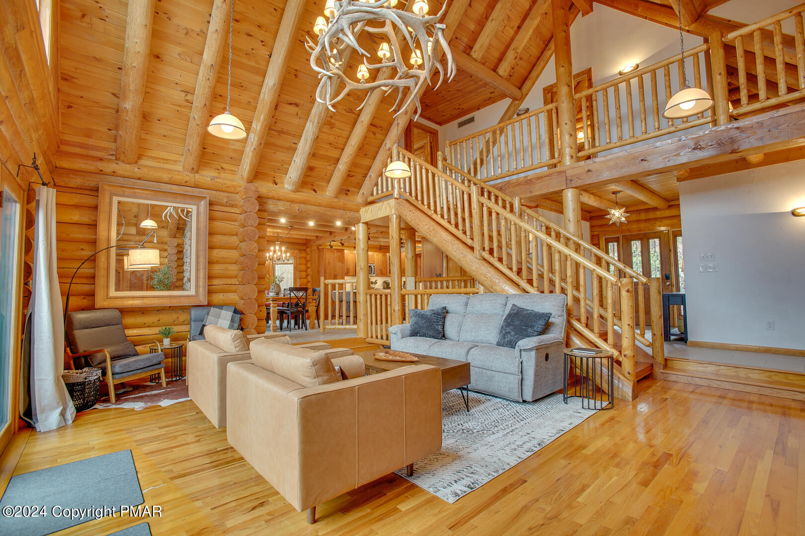 85 Starview Lane Wapwallopen, PA 18660 - Photo 73 of 102 a living room with couches and balcony with wooden floor