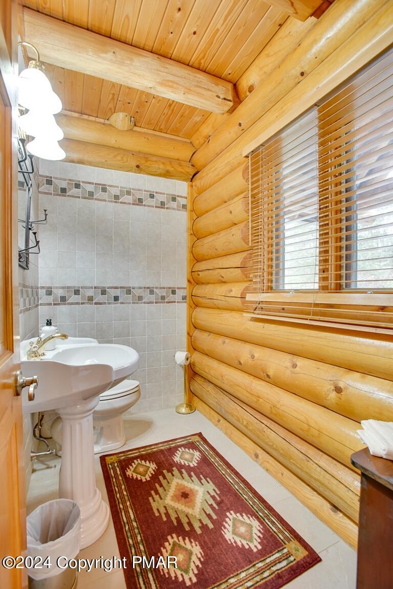 85 Starview Lane Wapwallopen, PA 18660 - Photo 81 of 102 a bathroom with a sink and toilet