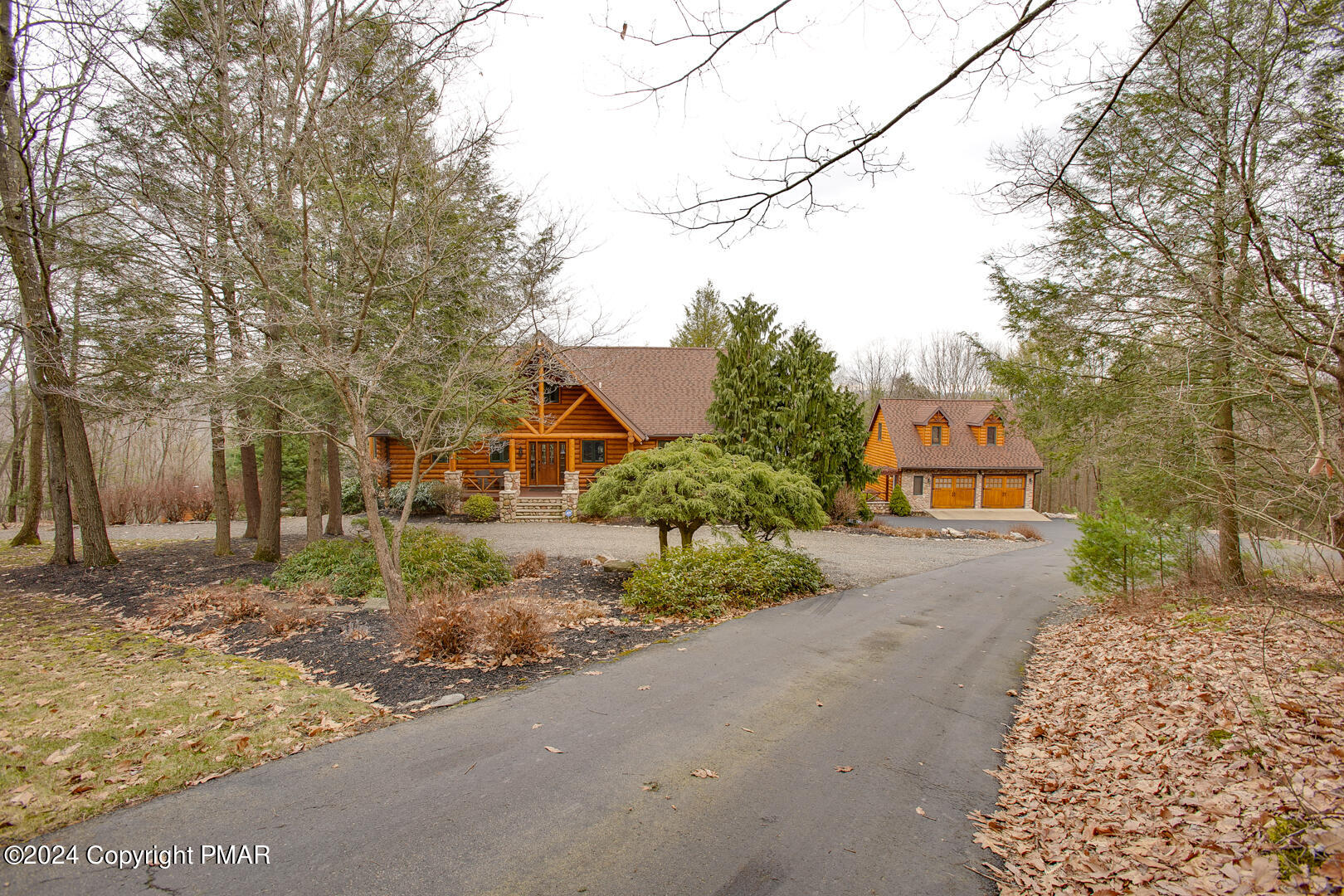 85 Starview Lane Wapwallopen, PA 18660 - Photo 94 of 102 a front view of a house with a yard and garage