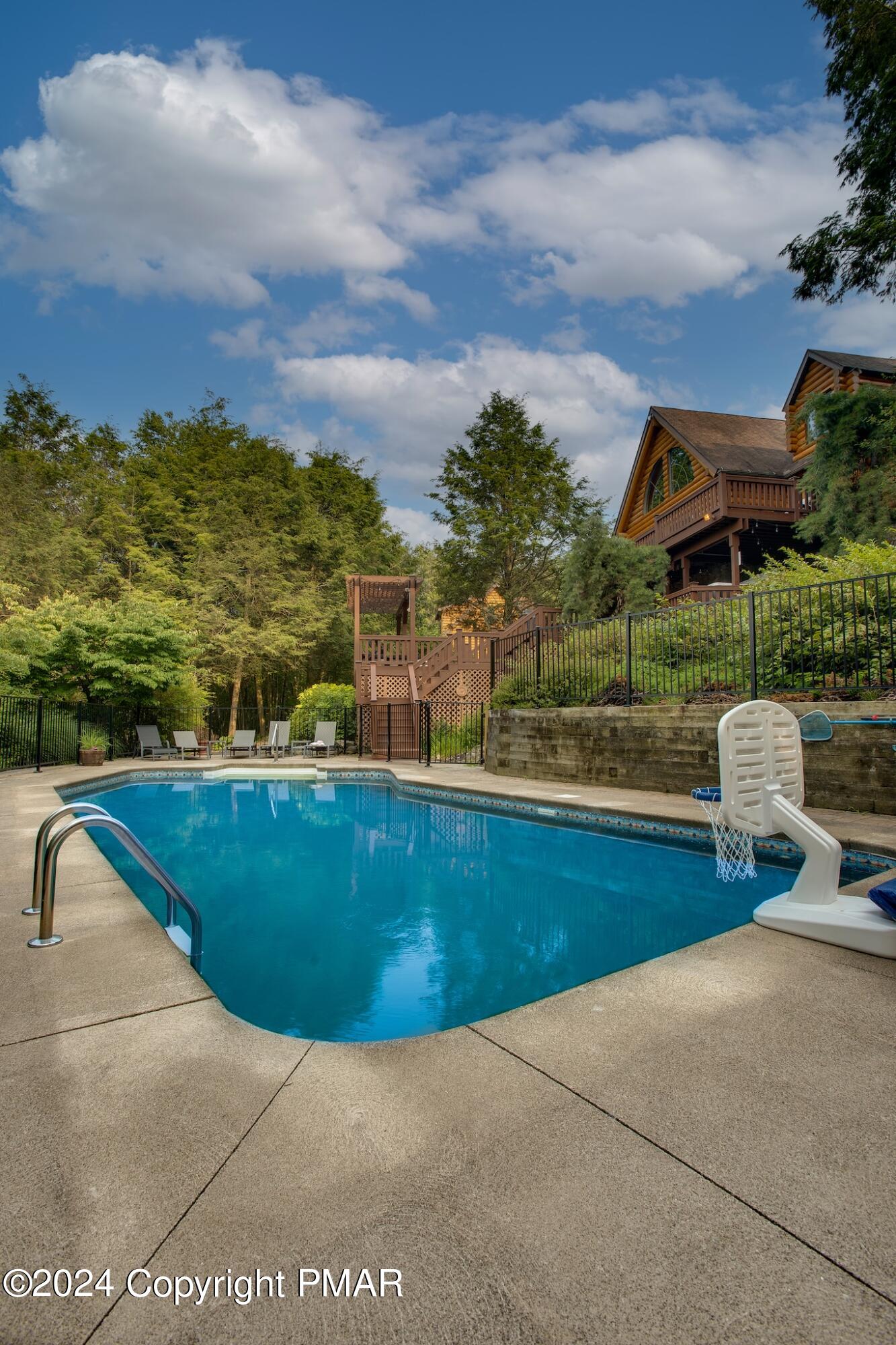 85 Starview Lane Wapwallopen, PA 18660 - Photo 98 of 102 a view of a swimming pool with a lounge chair and sky view
