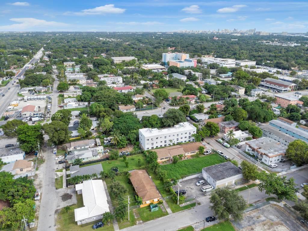 47 Northeast 80th Terrace Miami, FL 33138 - Photo 16 of 26 an aerial view of a city with lots of residential buildings