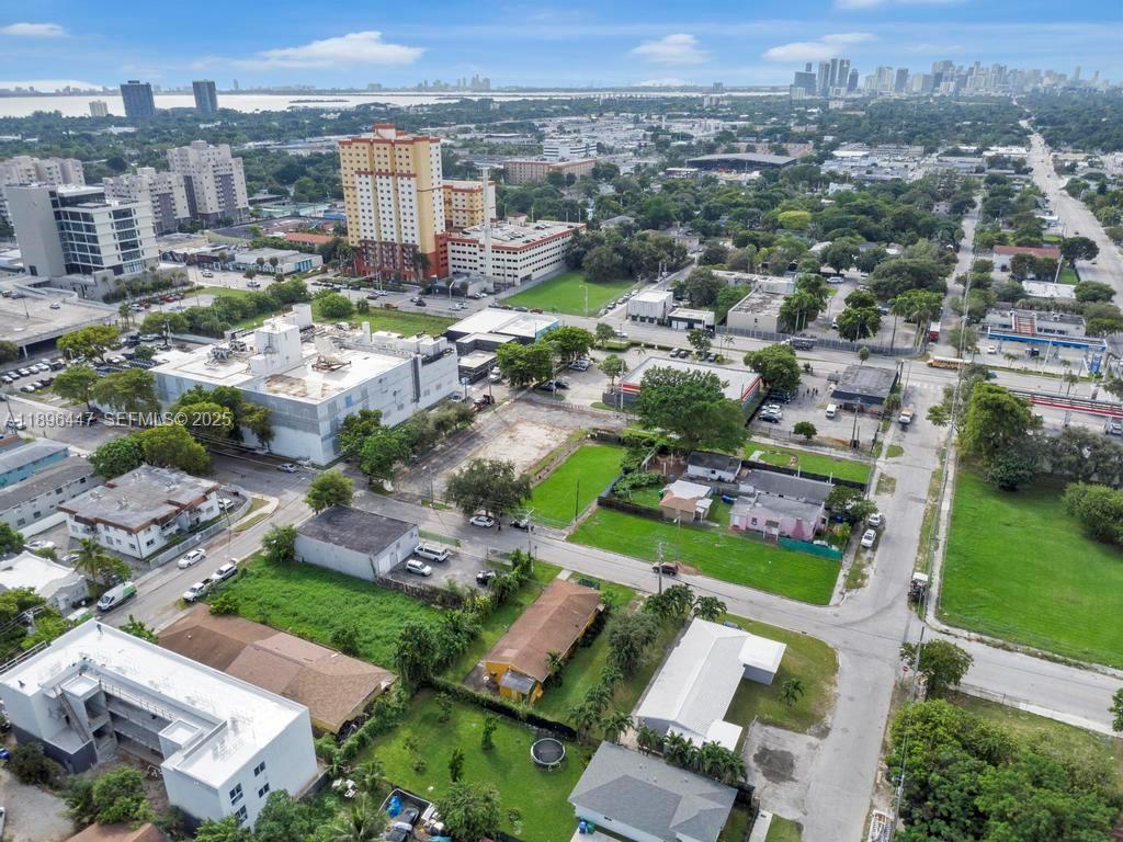 47 Northeast 80th Terrace Miami, FL 33138 - Photo 21 of 26 an aerial view of a city with lots of residential buildings