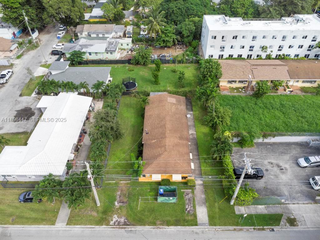 47 Northeast 80th Terrace Miami, FL 33138 - Photo 7 of 26 an aerial view of a residential houses with outdoor space and street view