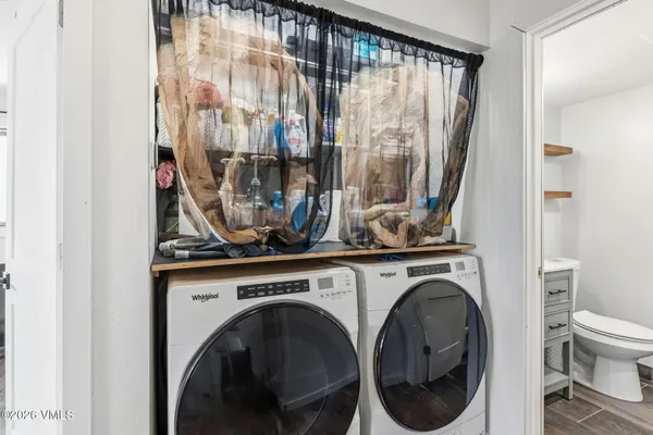 a view of living room with washer and dryer
