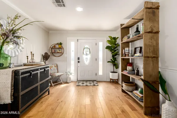 a kitchen with a refrigerator and a stove