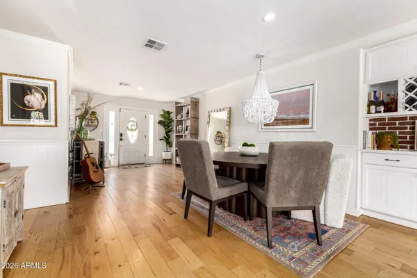 a view of a dining room with furniture