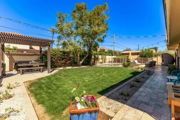 a view of a back yard of the house