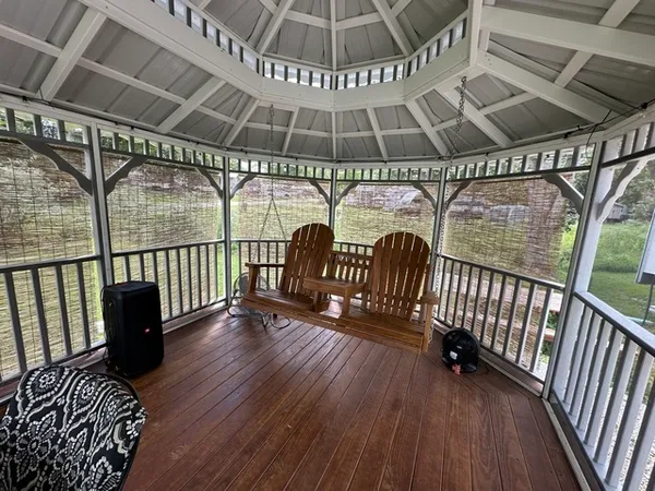 a view of staircase with wooden floor