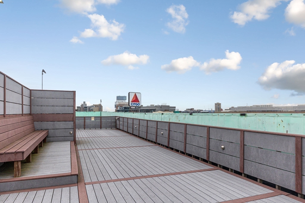 466 Commonwealth Avenue, Unit 502 Boston, MA 02215 - Photo 11 of 16 a view of a balcony with wooden floor