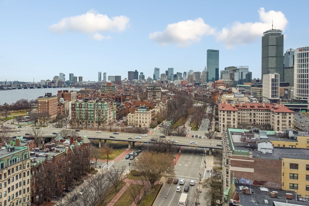 466 Commonwealth Avenue, Unit 502 Boston, MA 02215 - Photo 13 of 16 a view of a lake and city