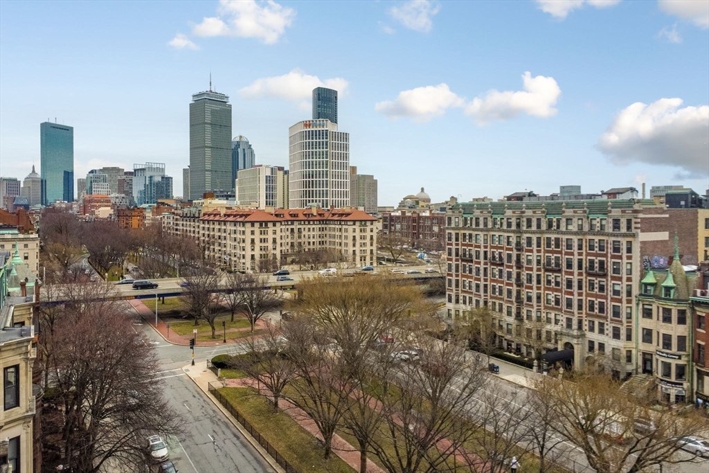 466 Commonwealth Avenue, Unit 502 Boston, MA 02215 - Photo 14 of 16 a view of a city with tall buildings