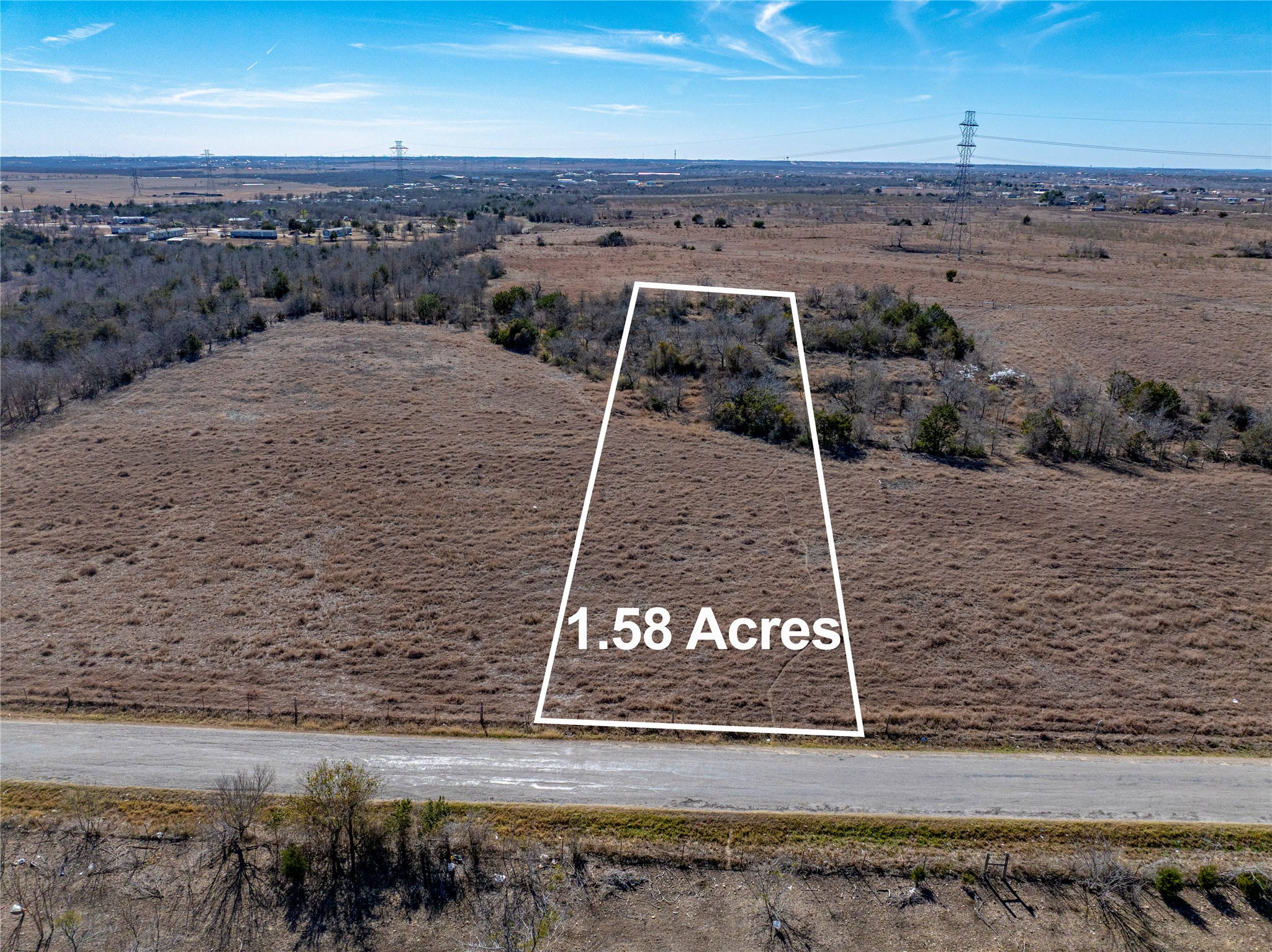Tbd Tbd Lane Kyle, TX 78640 - Photo 2 of 6 View of rural area featuring property parcel outlined and a desert landscape