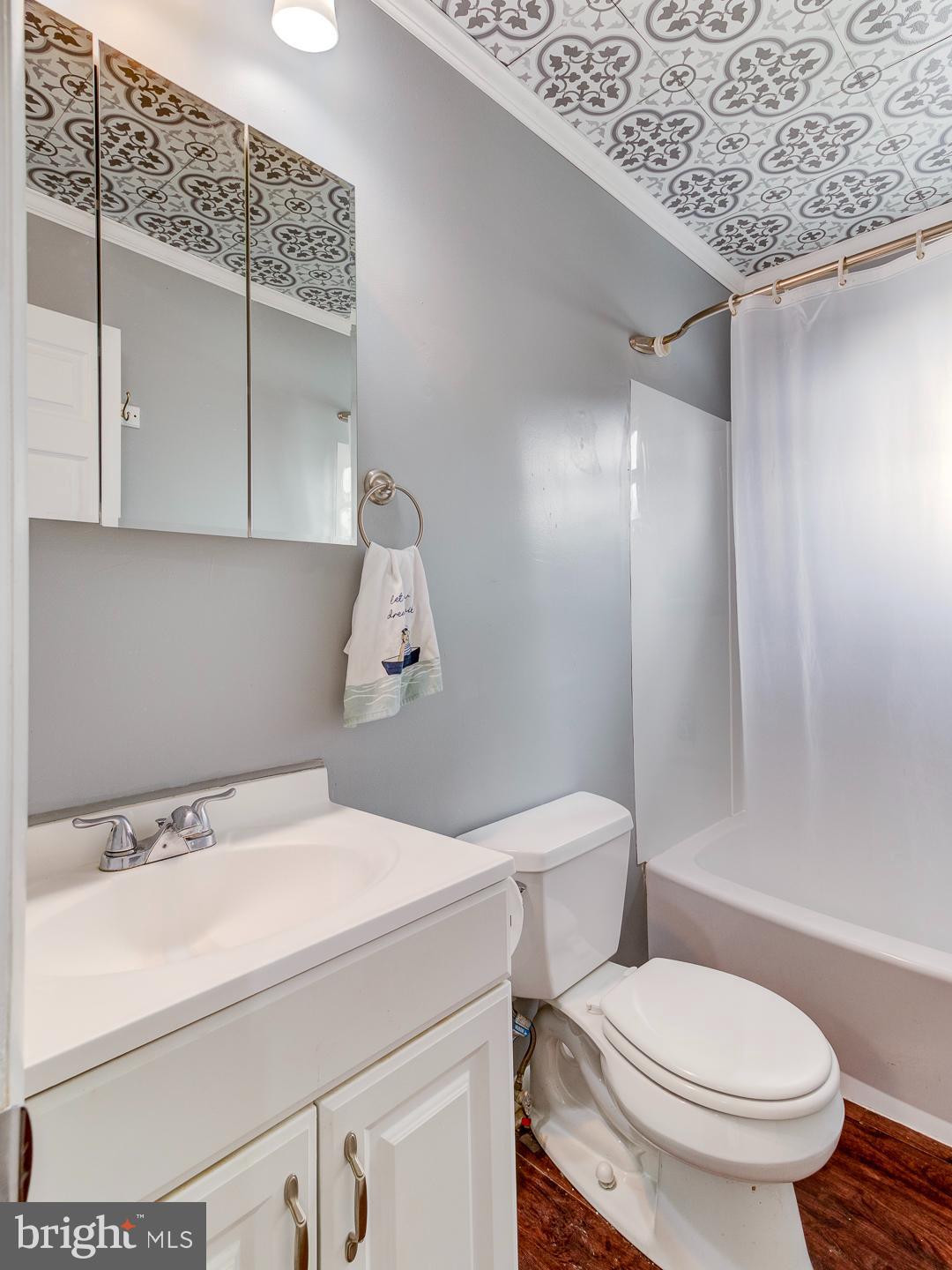 21 Louise Court Rising Sun, MD 21911 - Photo 16 of 25 a white toilet sitting next to a bathroom sink