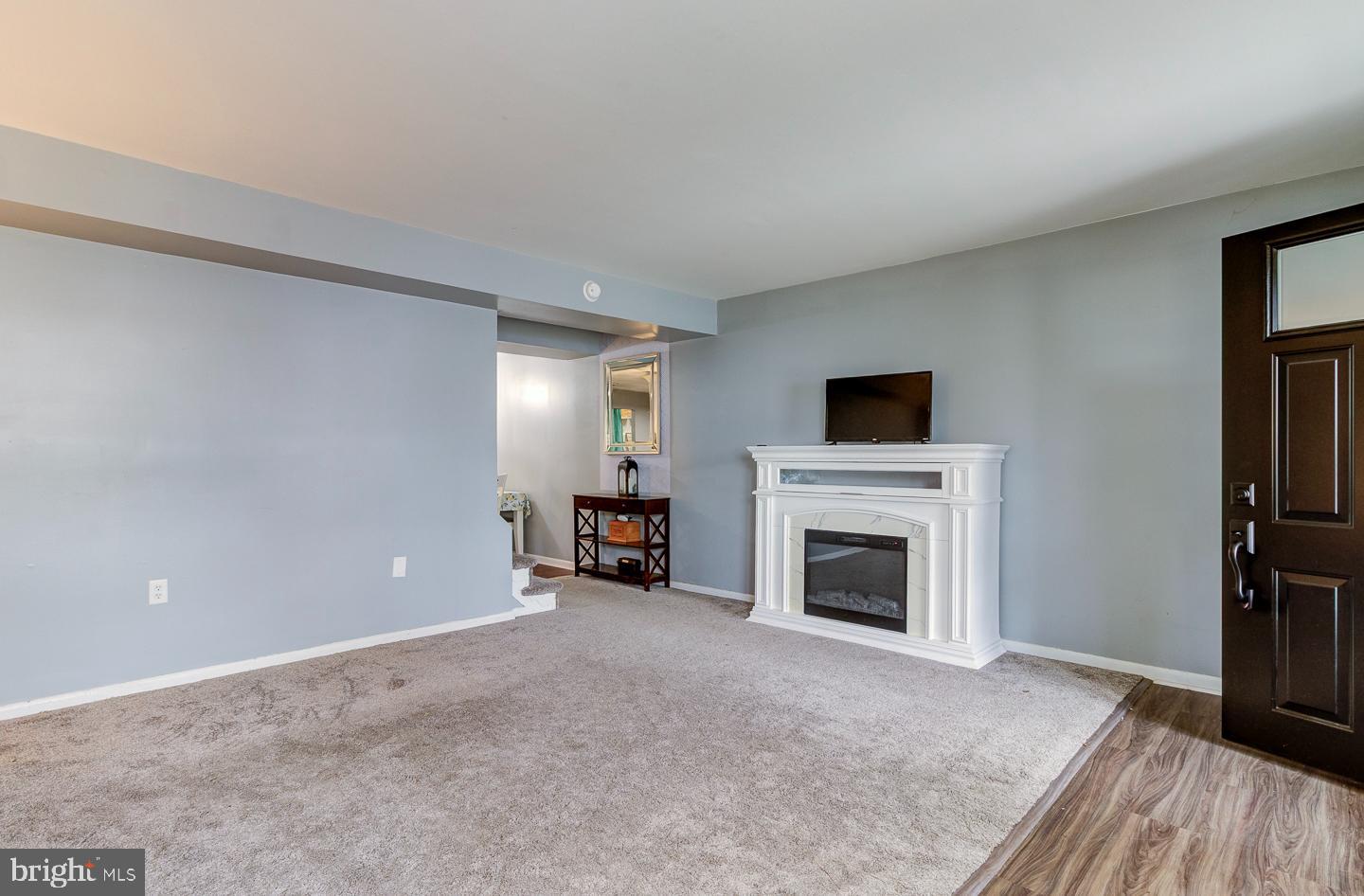 21 Louise Court Rising Sun, MD 21911 - Photo 3 of 25 a view of a livingroom with a fireplace and a television